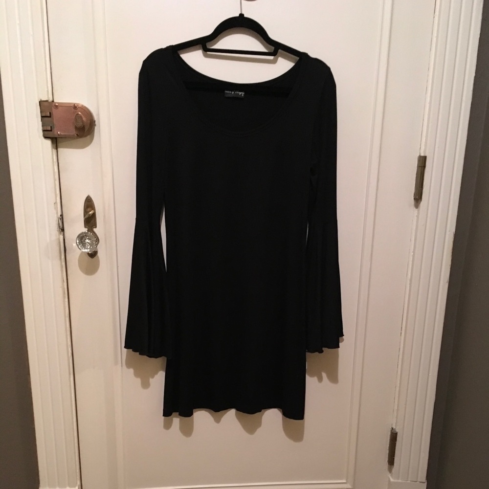 Black jersey knit dress with mod bell sleeve. NWOT